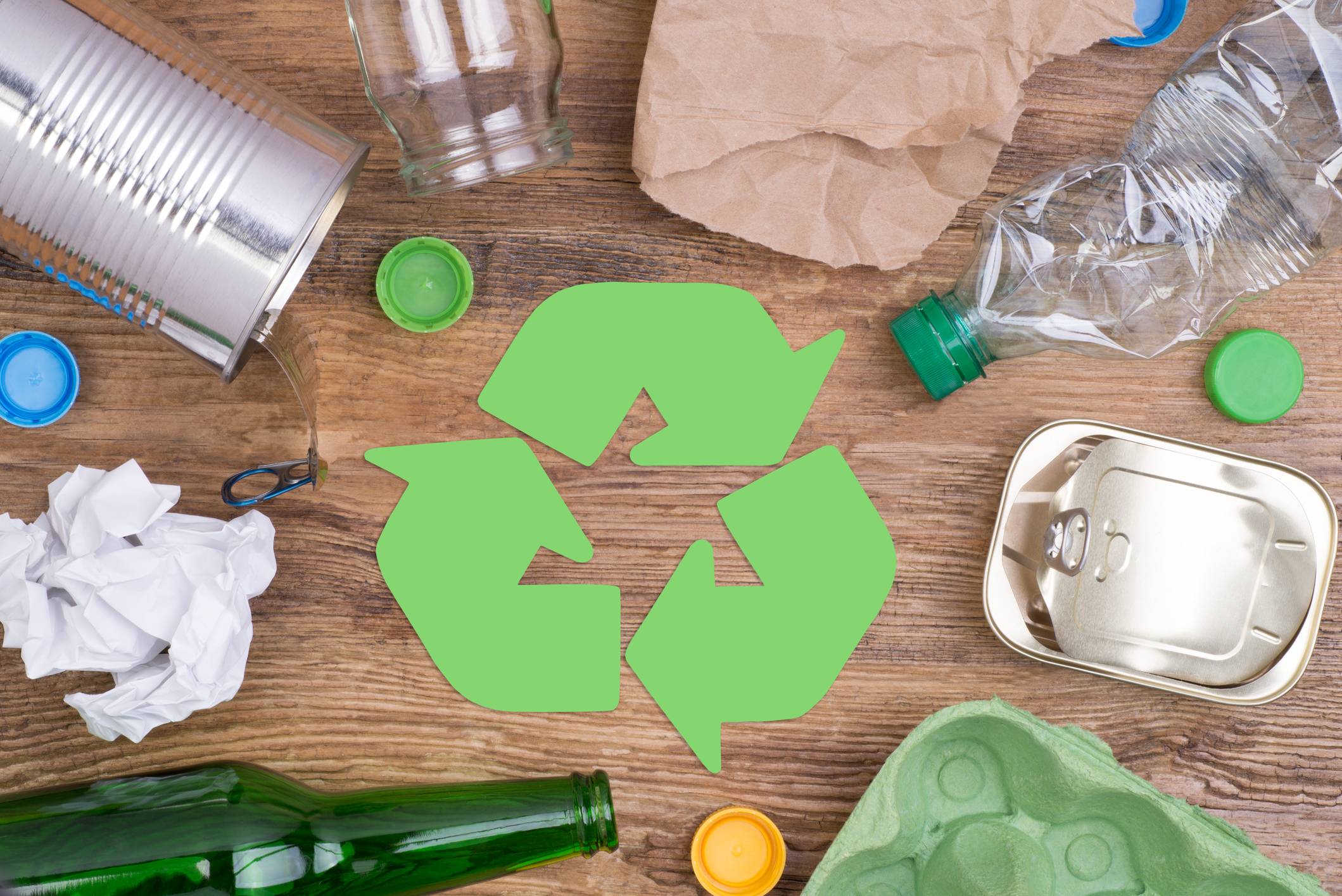 recycling symbol surrounded by plastic