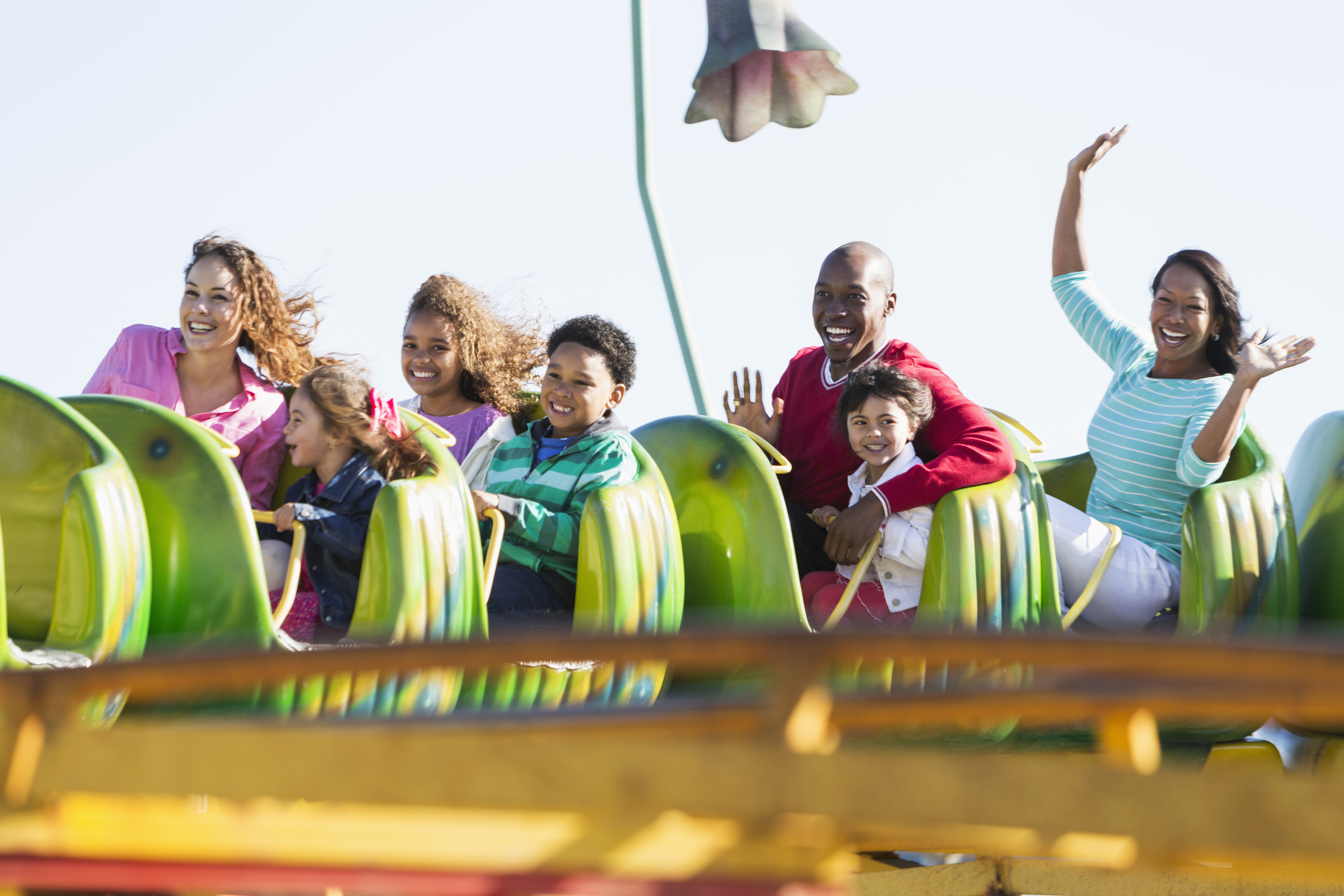people on a rollercoaster