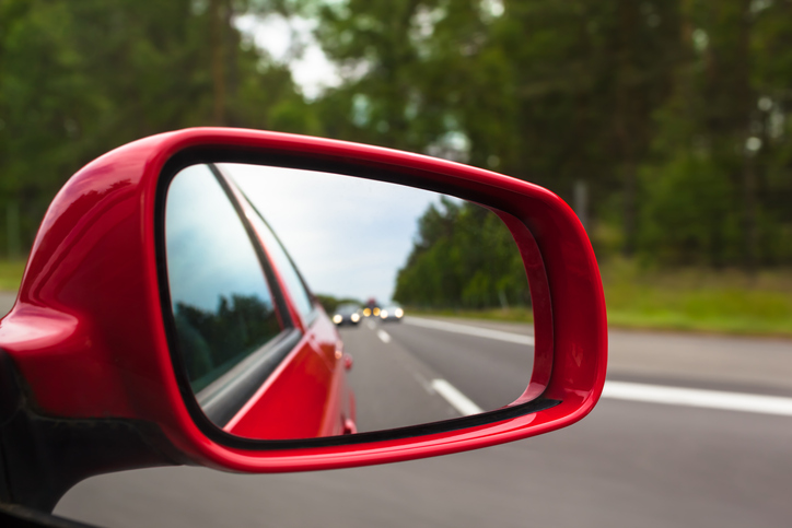 Reflection in a car mirror