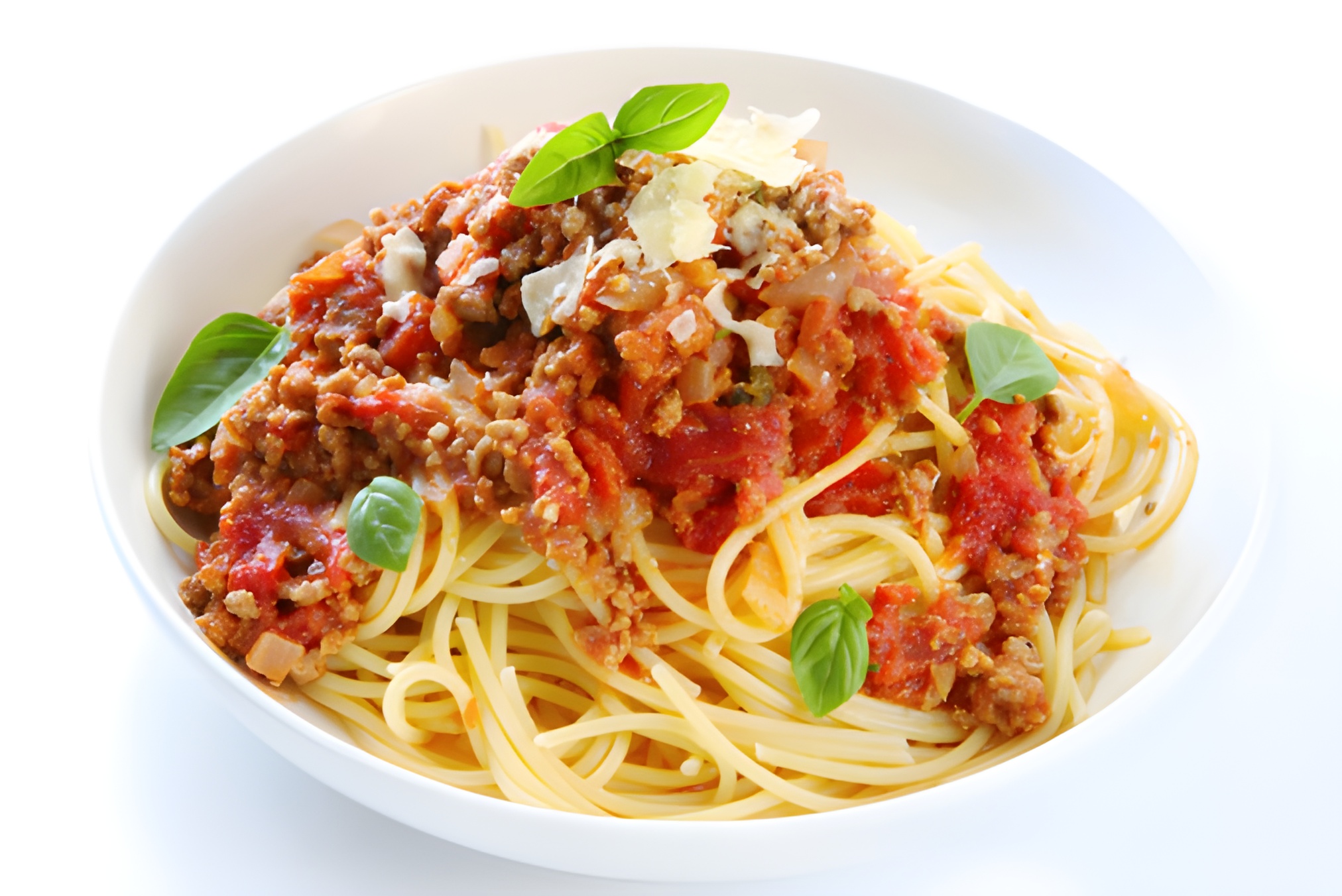 Bowl of spaghetti Bolognese with tomato sauce and basil