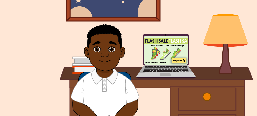 Child sitting at a desk with a laptop showing a flash sale advert.