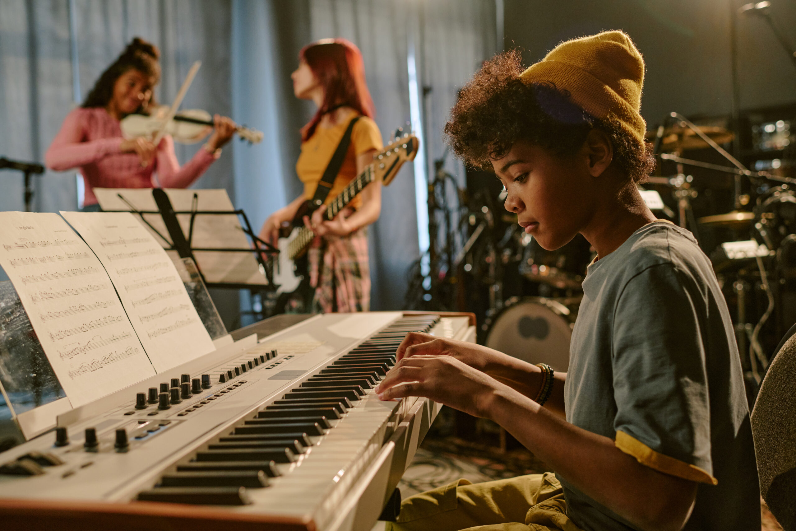 Boy Focused on Playing Keyboard