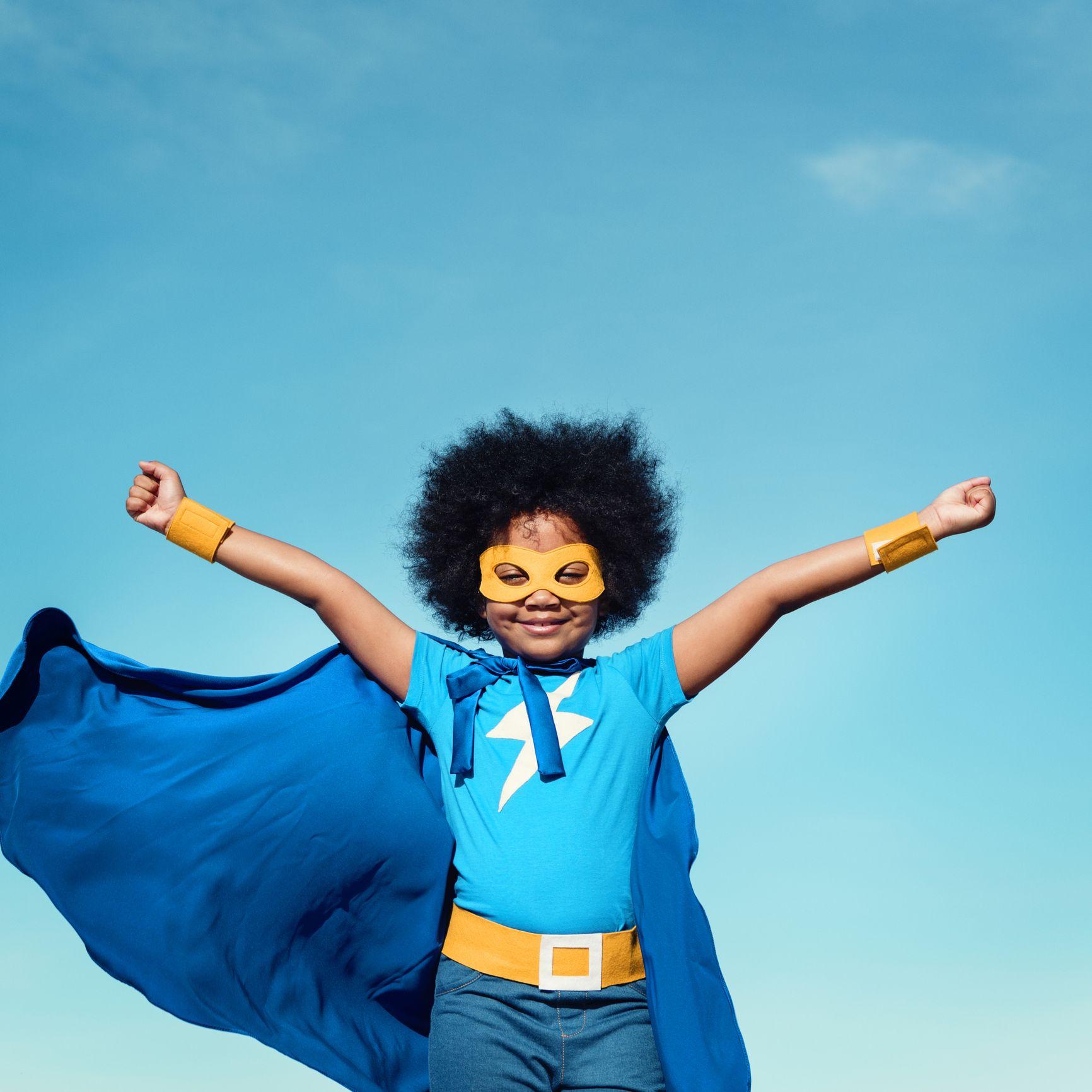 Child in superhero cape