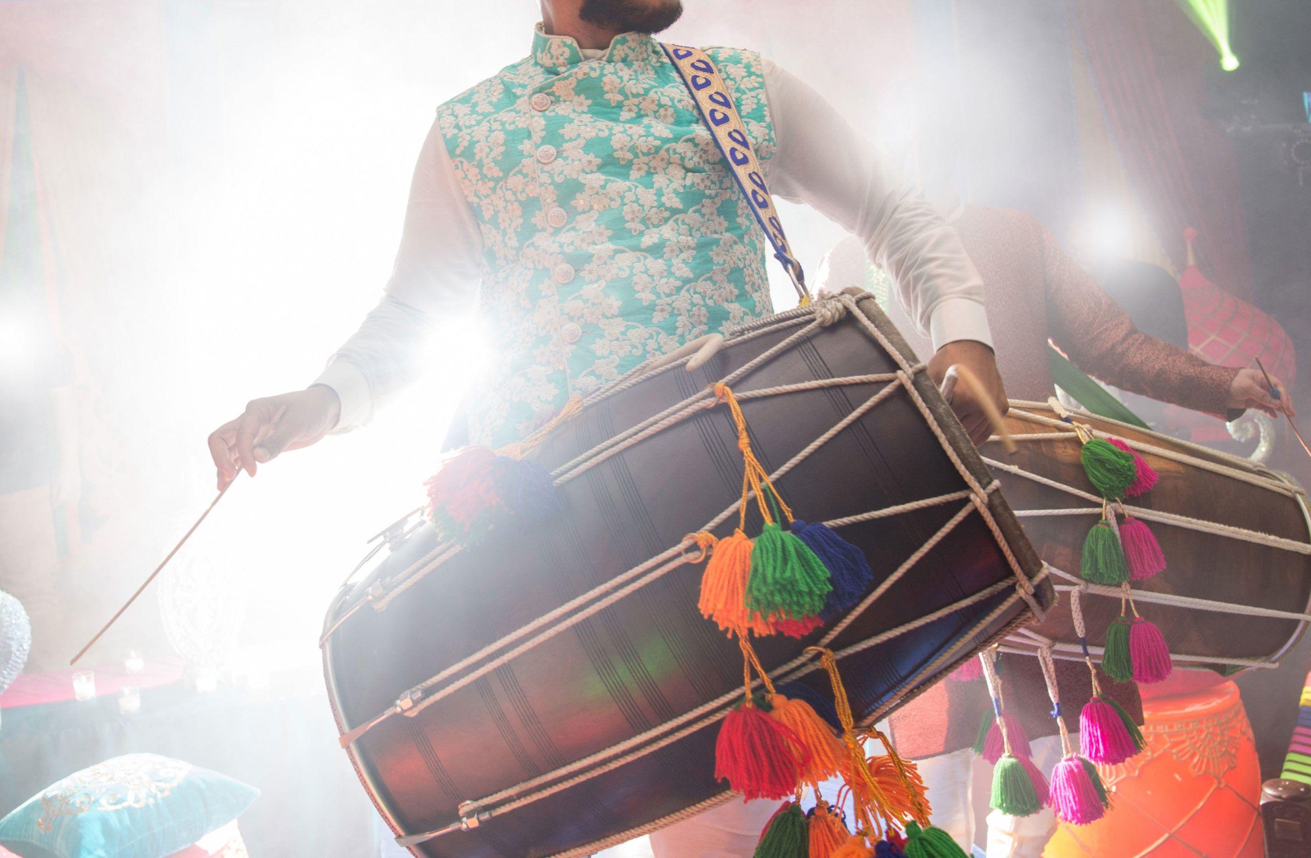 Indian musician playing the drum