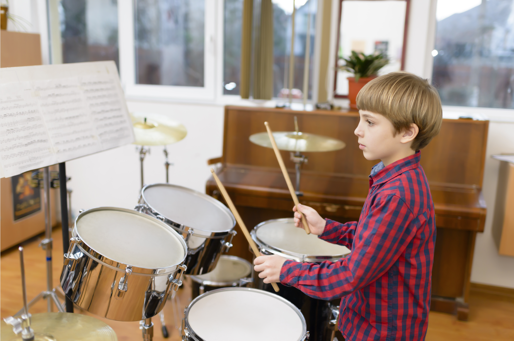 boy playing drums music