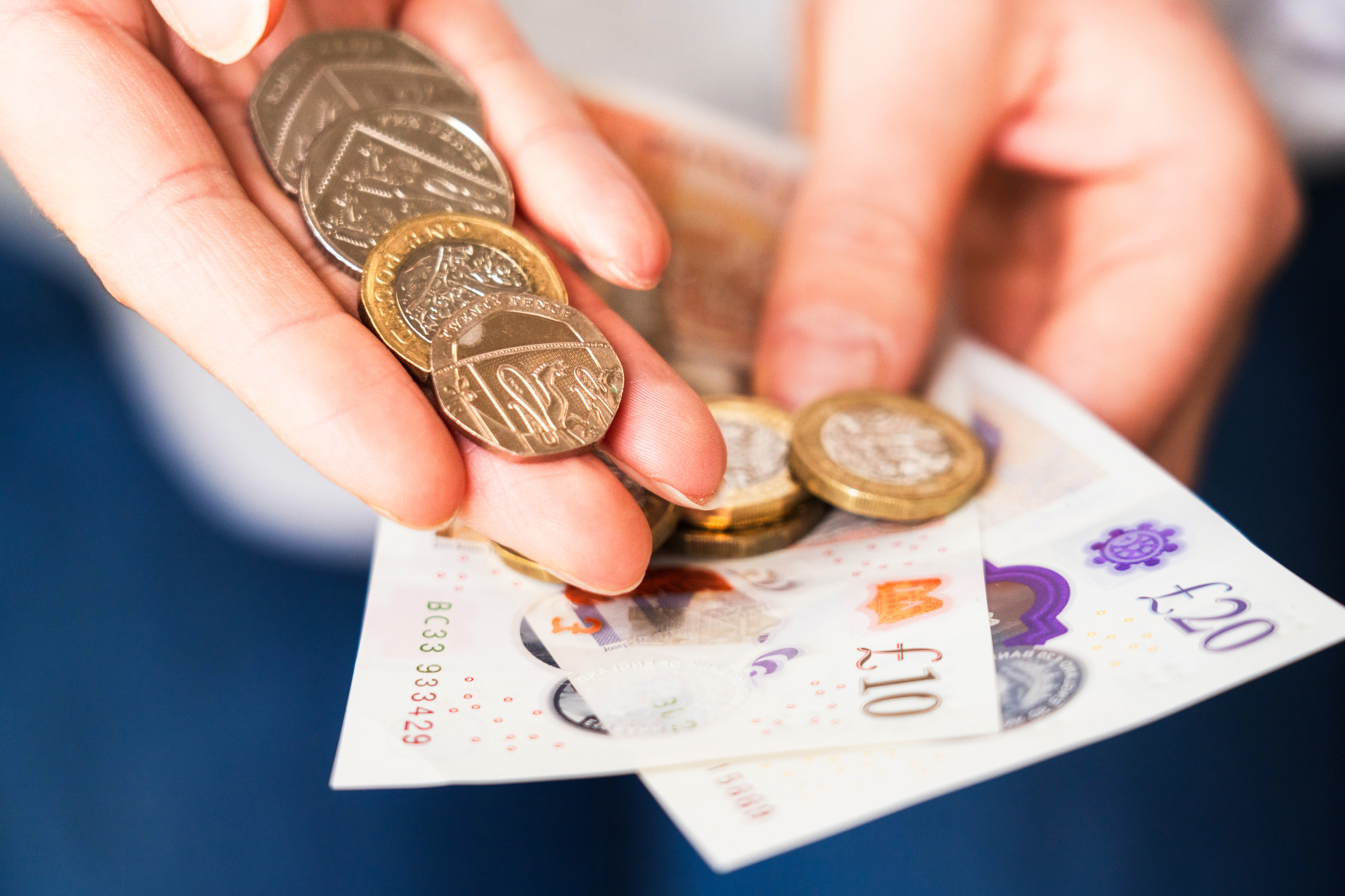 Showing UK coins and notes