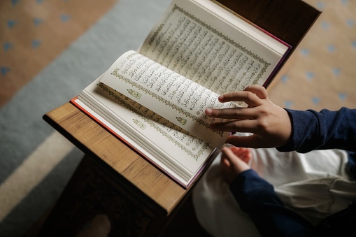 Qur'an read by a Muslim