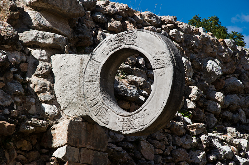 Ancient Mesoamerican stone hoop in a ballcourt wall