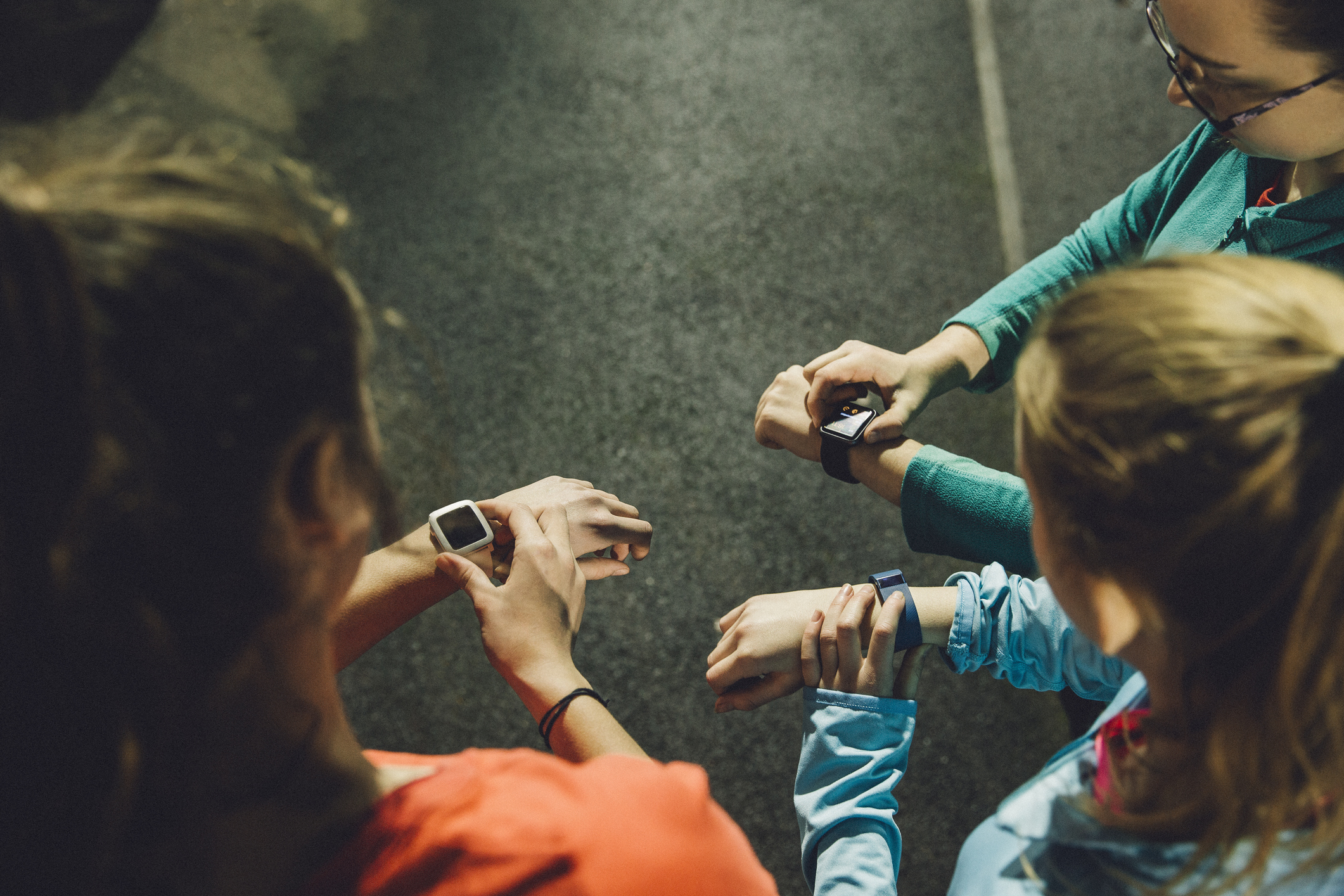 People using smart watches after exercising