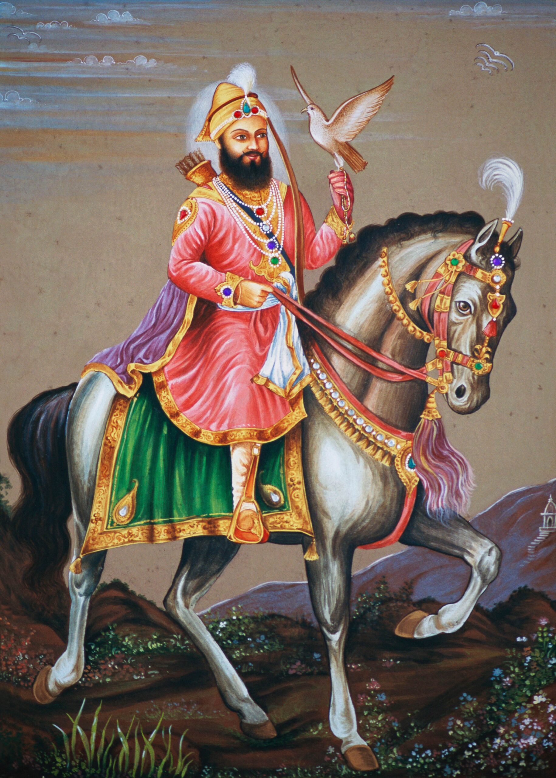 Portrait of Guru Gobind Singh, a Sikh leader, riding a horse with a bird on his hand.
