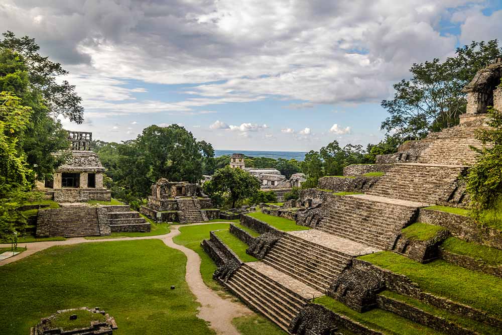 Stone temples and stepped pyramids in an ancient jungle city.