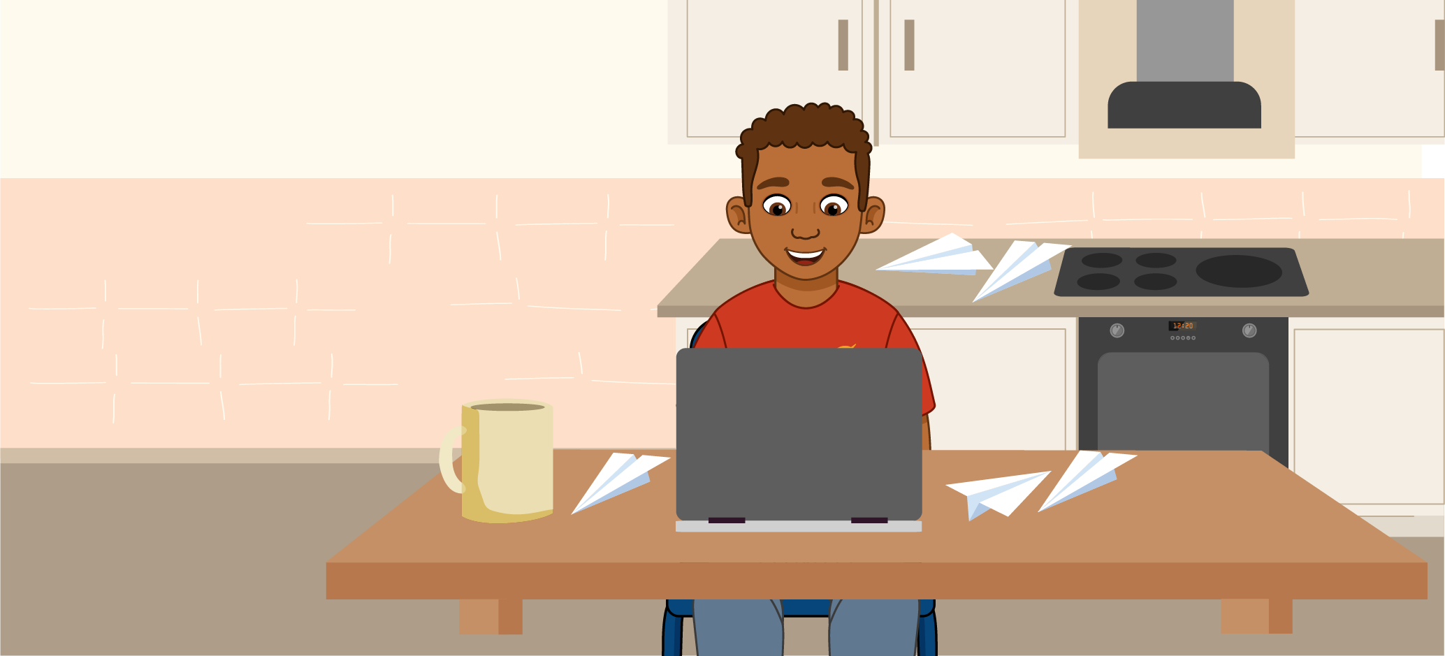 Child using a laptop at a kitchen table with paper aeroplanes nearby, representing online activity at home.