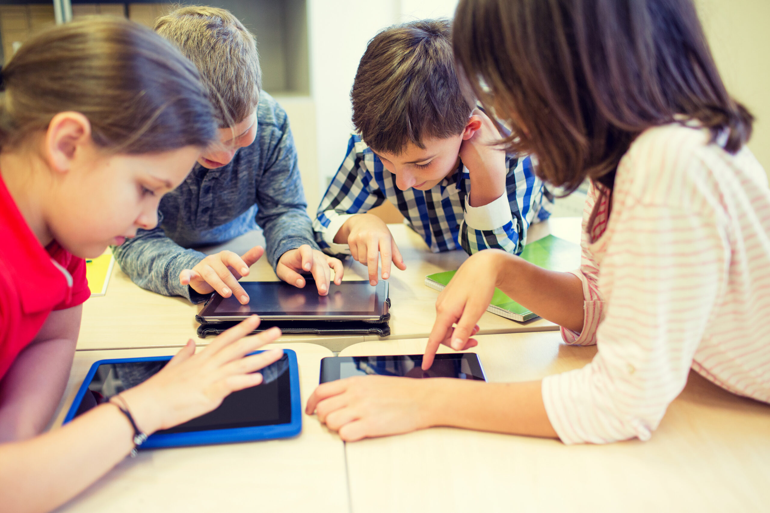 Children using tablets shutterstock 336098960 2